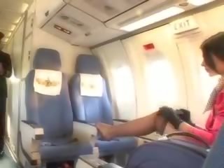 Charming stewardess sucking penis before cunnilingus